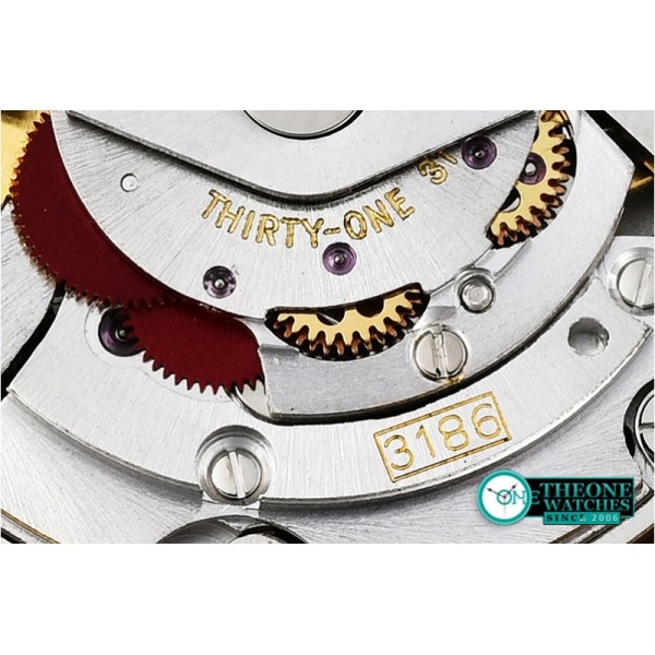 Rolex - GMT II Blk/Wht Rubies YG/YG Blk BP A3186 Mod